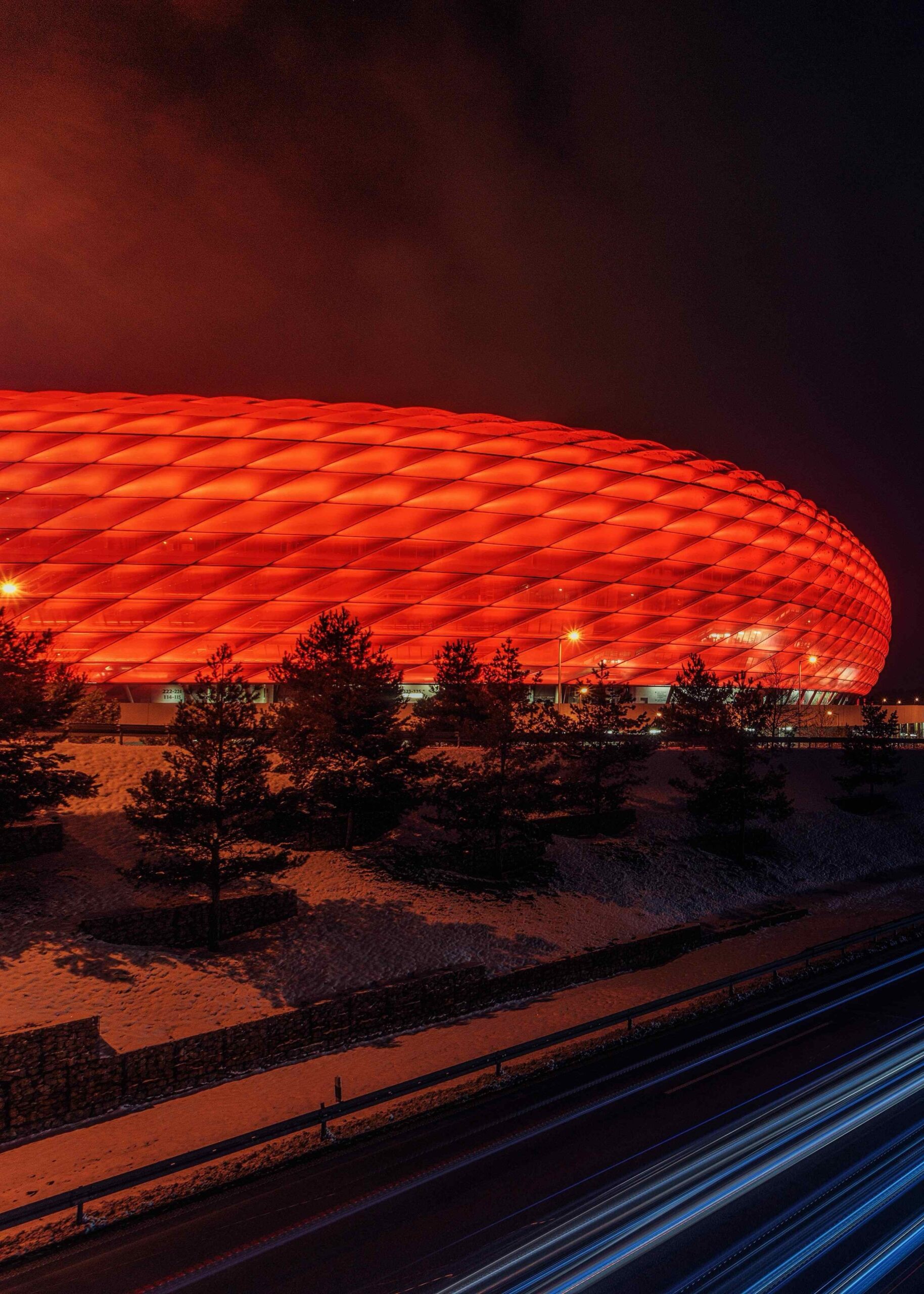 Rugby stadium illuminated at night in South Africa, highlighting iconic sporting venues on tour